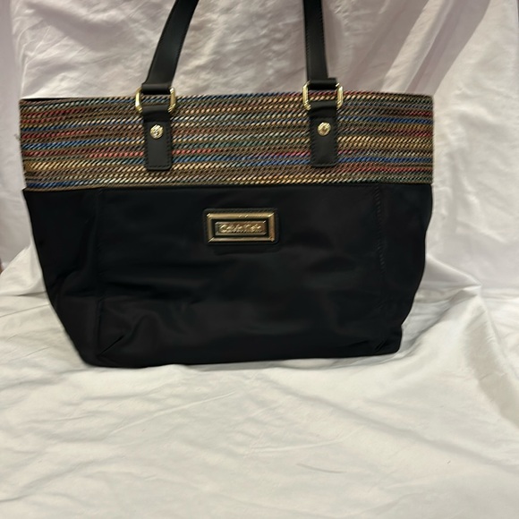 Calvin Klein Handbags - Calvin Klein Nylon purse with multi-colored band.